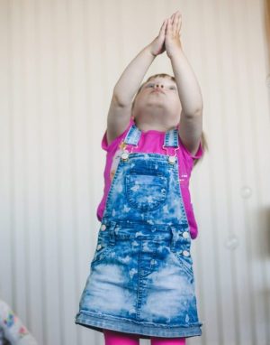 little-girl-skirt-catching-bubbles